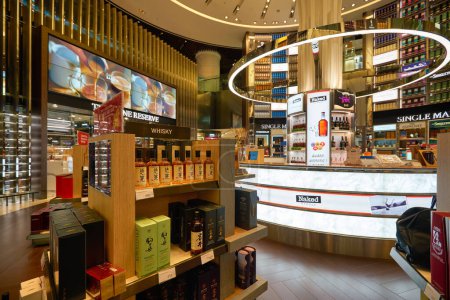 Photo for SINGAPORE - CIRCA JANUARY, 2020: a broad range of alcoholic drinks on display at Wines and Spirits store in Singapore Changi Airport. - Royalty Free Image