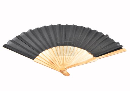Hand held fan out of bamboo on a white background