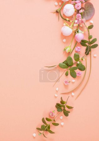 Photo for Pink roses with leaves on paper background - Royalty Free Image