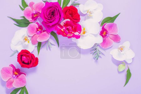 Photo for Pattern of summer flowers on color paper background - Royalty Free Image