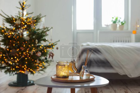 Photo for Diffuser and christmas decor in white bedroom - Royalty Free Image
