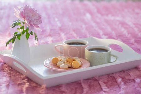 Photo for Two cups of coffee on white tray in bedroom - Royalty Free Image