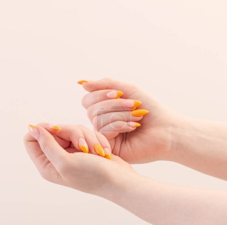 female hand with manicure on white background