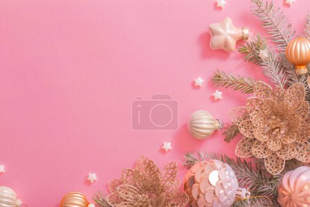 Photo for Golden christmas decorations  on pink background - Royalty Free Image