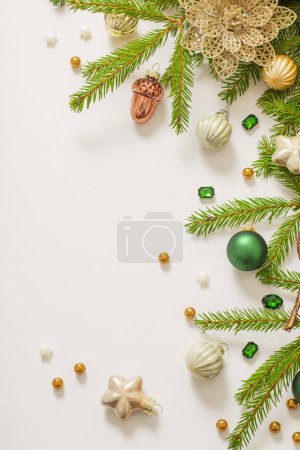 Photo for Golden and green  christmas decorations  on white  background - Royalty Free Image
