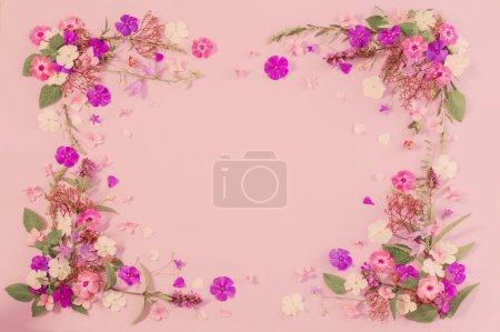 Photo for Pattern of summer flowers on color paper background - Royalty Free Image
