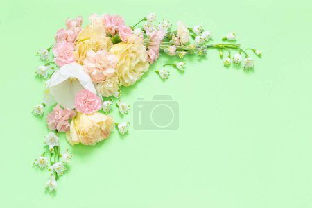 Photo for Beautiful spring flowers on green background - Royalty Free Image