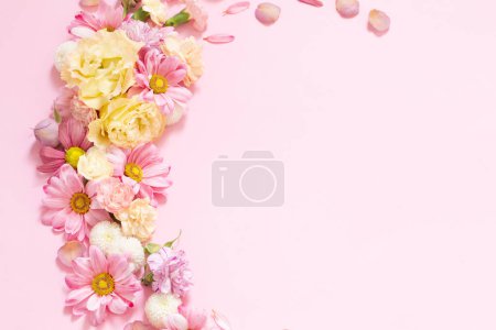 Photo for Beautiful flowers on pink background - Royalty Free Image