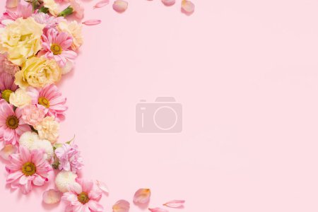 Photo for Beautiful flowers on pink background - Royalty Free Image