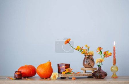 Photo for Autumn still life on wooden shelf on background wall - Royalty Free Image