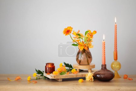Photo for Autumn still life on wooden shelf on background wall - Royalty Free Image