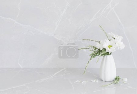 Photo for White chrysanthemums in  vase a on gray marble background - Royalty Free Image