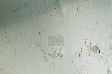 Foto de Viejo fondo de superficie de cemento blanco con grietas - Imagen libre de derechos