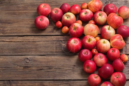 Photo for Red apples on old wooden background - Royalty Free Image