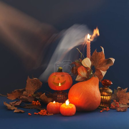 Photo for Halloween decor with pumpkins on dark blue background - Royalty Free Image