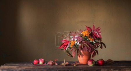 Photo for Beautiful autumnal composition on wooden table - Royalty Free Image