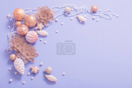 Photo for Golden christmas toys on purple  background - Royalty Free Image