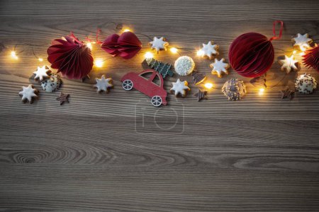 Photo for Christmas decor and  cookies  with lights on wooden table - Royalty Free Image