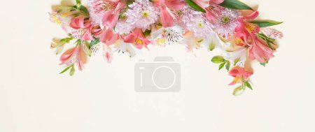 Photo for Alstroemeria and chrysanthemums  flowers on yellow  background - Royalty Free Image