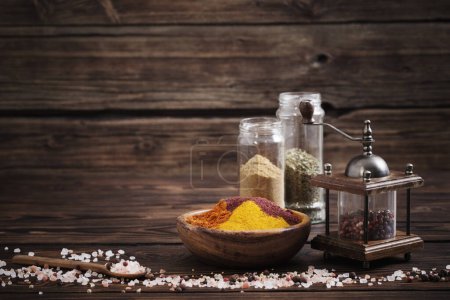Photo for Spices on old dark wooden background - Royalty Free Image