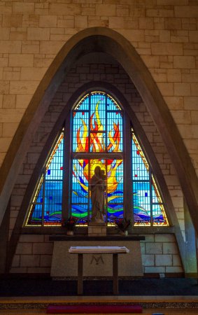 Photo for View of the stained glass window on the side chapel of the Saint Mary Star of the Sea Cathedral, in Darwin, Northern Territory, Australia - Royalty Free Image
