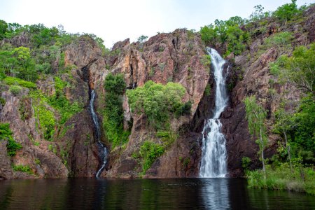 Wangi Falls is a segmented waterfall into a plunge pool on the Wangi Creek, located in Litchfield National Park, Northern Territory, Australia