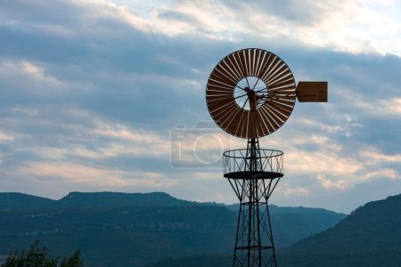 Photo for Windmill on a metal mast - Royalty Free Image