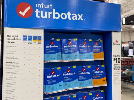 Photo for Novi, Michigan, US - March 19, 2023: A shelf in a Costco store with Turbo Tax packages. TurboTax is an American tax preparation software. - Royalty Free Image