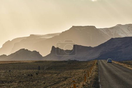 Photo for Twilight landscape in Iceland with mountains and dim road - Royalty Free Image