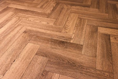 Photo for Shiny wooden floor reflecting light - Royalty Free Image