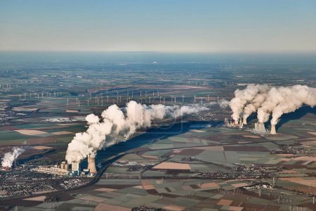 Photo for Lignite coal fired power plants polluting the atmosphere in Germany, Neurath Power Station, Niederaussem Power Station, aerial view - Royalty Free Image