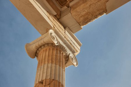 Photo for Ancient buildings at the Acropolis of Athens, decorated column with Ionic capital decoration detail - Royalty Free Image