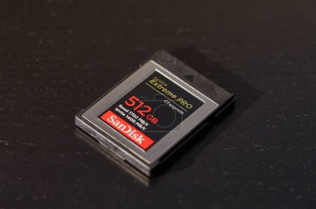 Photo for Budapest, Hungary, Circa June 2022: Proffessional 512GB CFexpress memory card for photography and video recording made by Sandisk, a reputable manufacturer. Fat card for capturing 4k and 8k raw video - Royalty Free Image