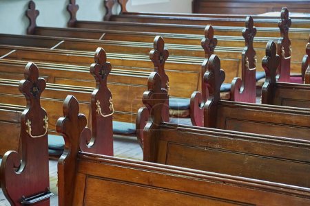 Photo for Old, wooden benches of church - Royalty Free Image