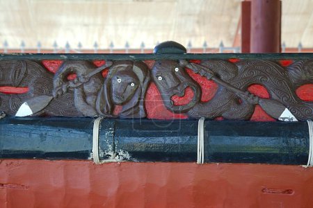 Photo for Whakatane, New Zealand - March 04, 2016: Traditional canoe detail decorated with Maori art motives carved in the wood - Royalty Free Image