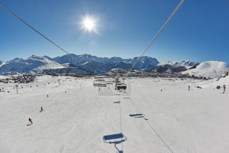 Photo for Ski lift in the Alps, ski resort in Alpe dHuez, sunny weather - Royalty Free Image