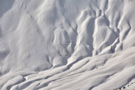 Photo for Snowy mountain slopes in the the Alps, untouched powder snow for freeride - Royalty Free Image