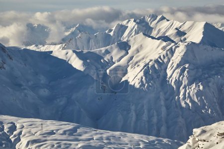 Photo for Snowy mountains in winter weather, epic Alpine high mountain landscape panorama - Royalty Free Image