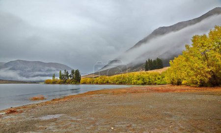 Photo for Autumn lakeside landscape in New Zealand, on the was to Arthurs Pass - Royalty Free Image