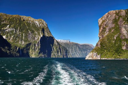 Photo for Iconic landscape at Milford Sound in Fiordland, New Zealand. Going on a touristic boat ride - Royalty Free Image