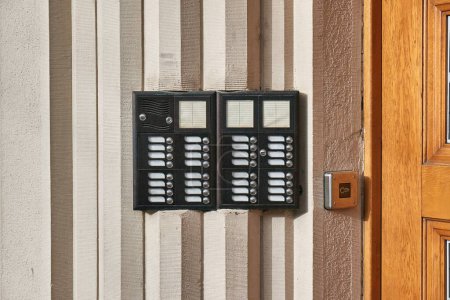 Doorphone intercom and bell buttons for apartments of a city residential building