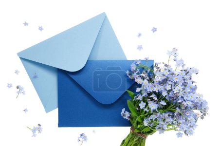 Photo for Blue envelope with wedding invitation card or birthday letter decorated with bouquet of wild forget me not flowers on white. Flat lay. Top view. - Royalty Free Image