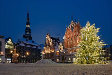 Photo for Riga Town Hall Square with a decorated Christmas tree before the Christmas holidays in downtown of old Riga city, Latvia. - Royalty Free Image