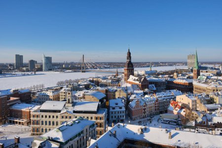 Photo for Panoramic view from tower of Saint Peters Church on Riga Cathedral and roofs of old houses in old city of Riga, Latvia in winter. - Royalty Free Image