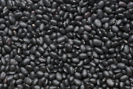 Foto de Fondo frijoles negros. Textura de granos de frijol negro, vista superior. - Imagen libre de derechos