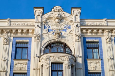 Photo for Latvian tourist landmark attraction - Art Nouveau architecture, building fasade of Riga city, Latvia. - Royalty Free Image