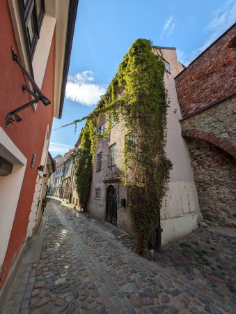 Photo for Old medieval narrow street in old town of Riga city, Latvia. - Royalty Free Image