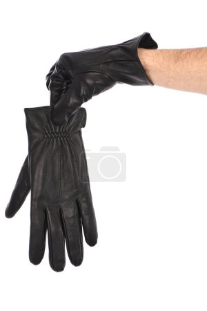 Photo for Man wearing black leather glove on white background, closeup. Side view. High resolution photo. Full depth of field. - Royalty Free Image