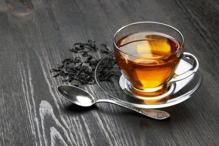 Photo for Cup of Tea on a dark wooden background - Royalty Free Image