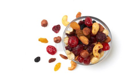 Photo for Set of nuts and dried fruits in a bowl. Hazelnut, cashew, almonds, raisin, cranberry, cherry, isolated on a white background. - Royalty Free Image